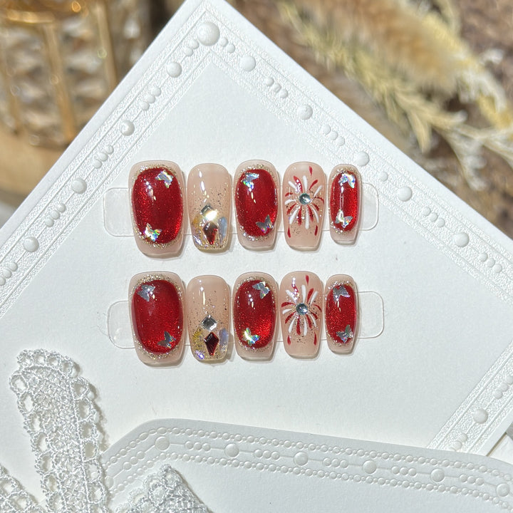 Künstlerisches Press-On Nail Set mit Glitzer und Sternelementen Karnz