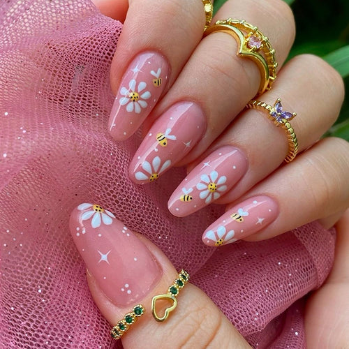 Kunstnägel Set mit eleganten Blüten und Glitzerakzenten Karnz