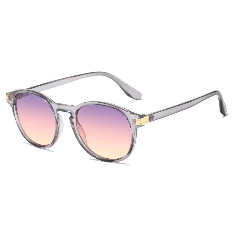 Damen elegante Sonnenbrille mit transparentem Rahmen und stylischen Akzenten Karnz