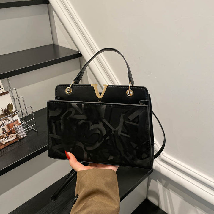 Glänzende strukturierte Handtasche