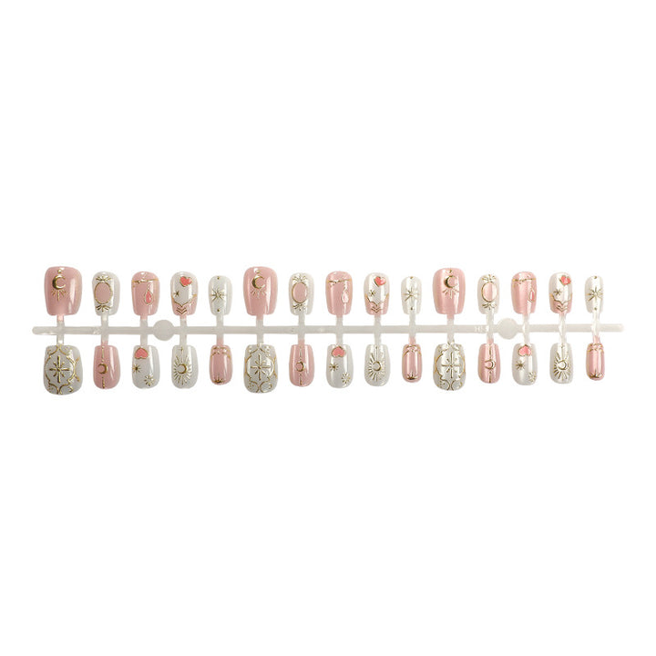 Dekoratives Press-On Nagelkunst-Set mit himmlischem und geometrischem Design