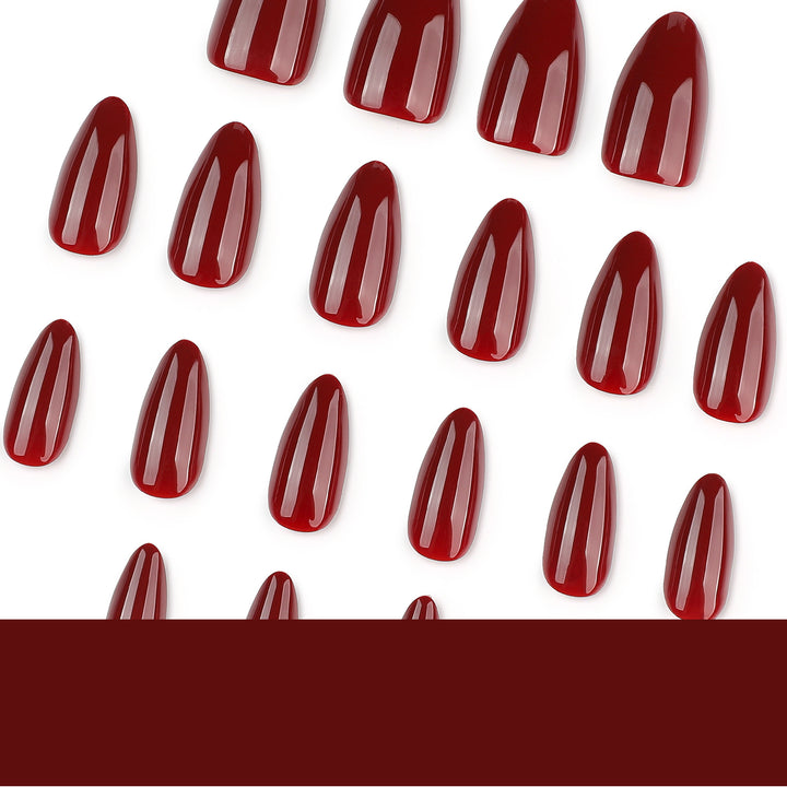 Glamouröse Stiletto-Nägel mit Hochglanz- und eleganten Designakzenten Karnz
