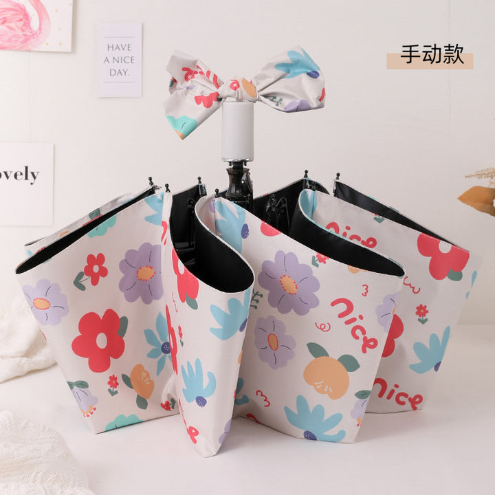 Damen Faltbarer Regenschirm mit bunten Blumenmotiven Karnz