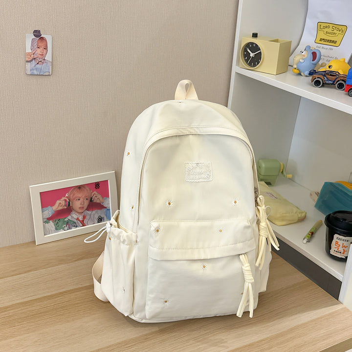 Stylischer backpack mit floralem Schmuck Karnz