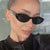Damen Cat-Eye Sonnenbrille mit modernem transparentem Rahmen Karnz