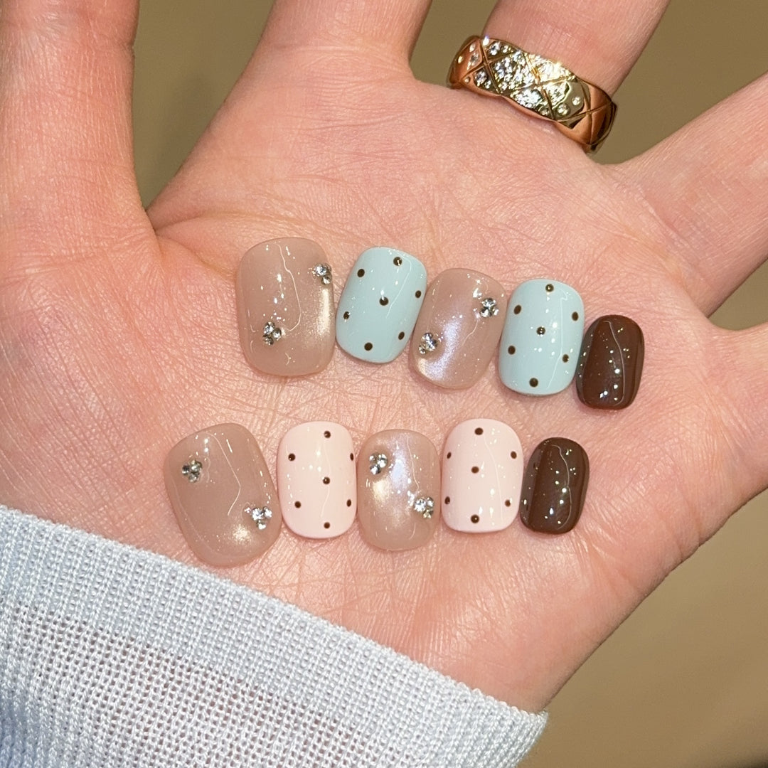 Kunstnägel mit Strass und Glitzer Karnz
