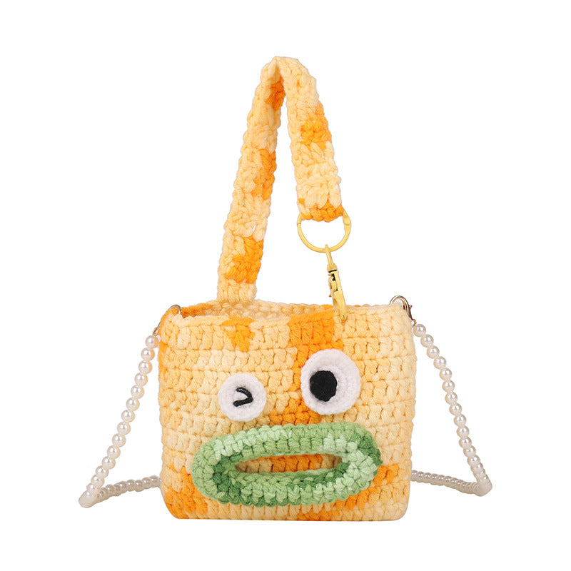 Niedliche gehäkelte Handtasche im Tierdesign
