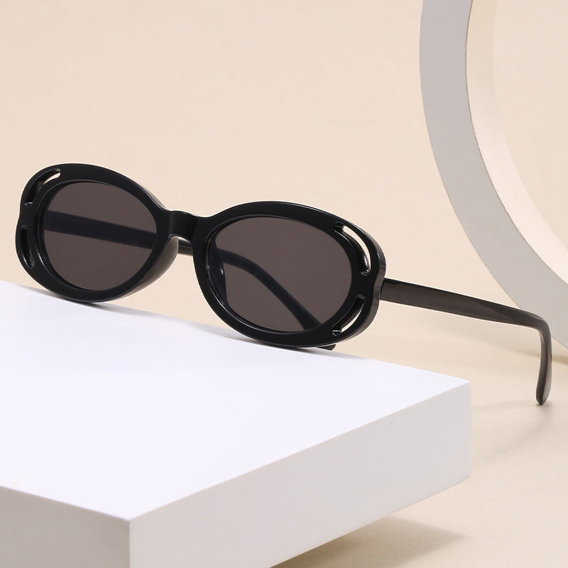 Damen modische Sonnenbrille mit ovalem Rahmen und einzigartigem Design Karnz