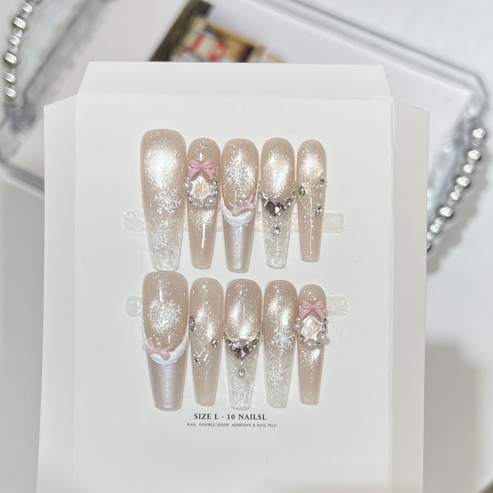 Dekorativer Stiletto Press-On Nagelset mit Strass- und Glitzerakzenten Karnz