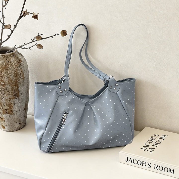 Stilvolle gepunktete Sling Bag