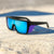 Damen Sportsonnenbrille im modernen Design mit breitem Rahmen und polarisierenden Gläsern Karnz
