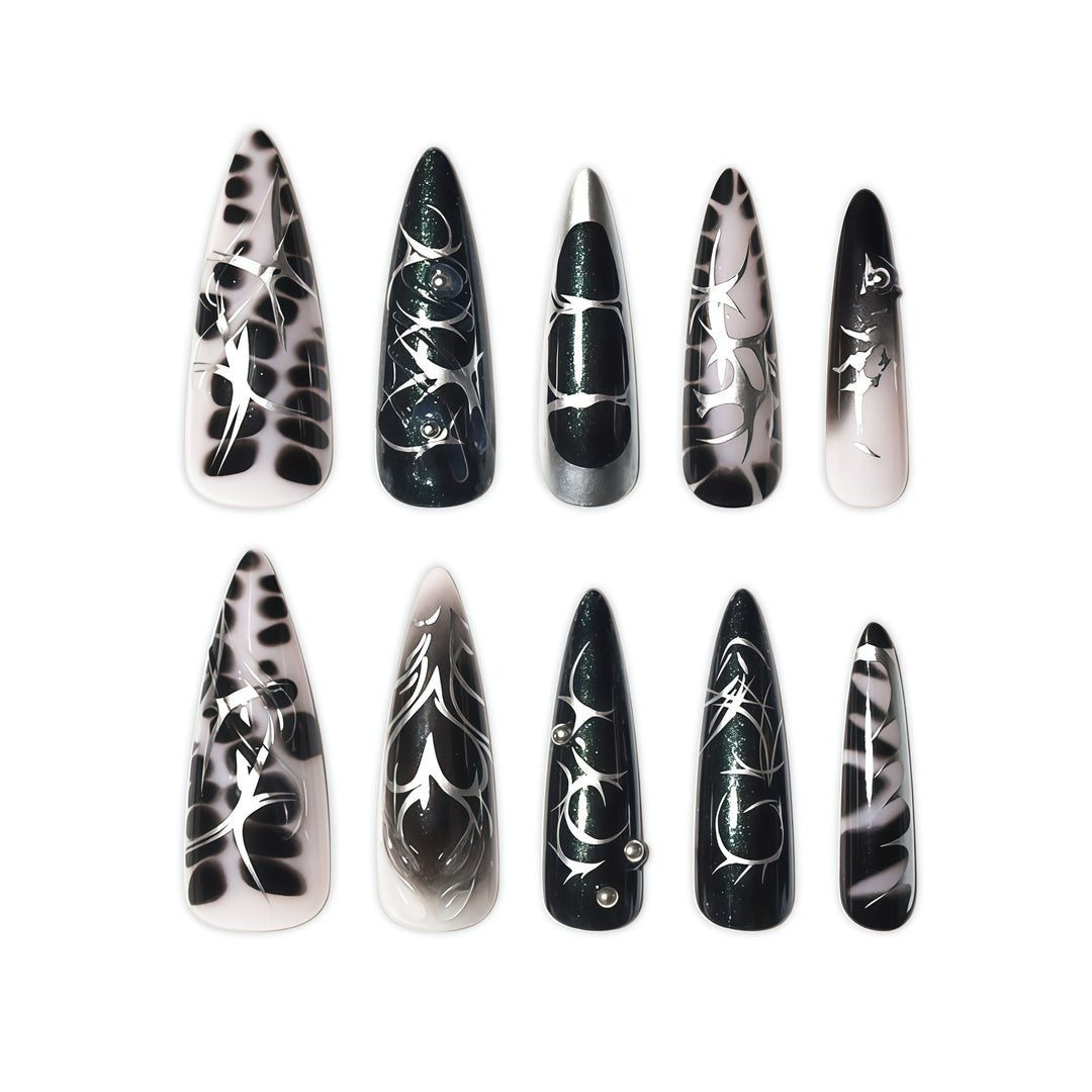 Elegante Stiletto-Nagelkunstverlängerungen mit aufwändigem Design Karnz