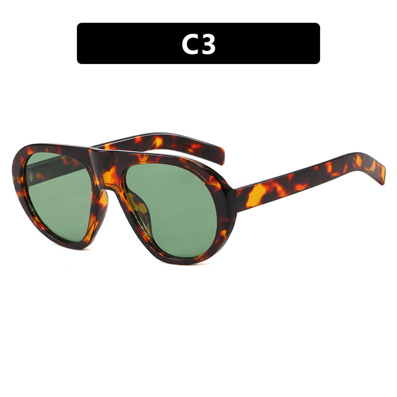 Damen auffällige Sonnenbrille mit futuristischem Rahmen und robustem Design Karnz
