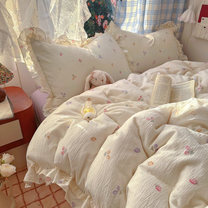 Blumenverziertes Steppbett-Set