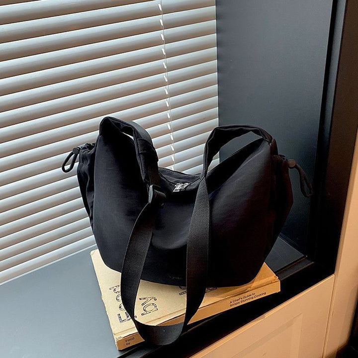 Entspannte Sling-Tasche Karnz