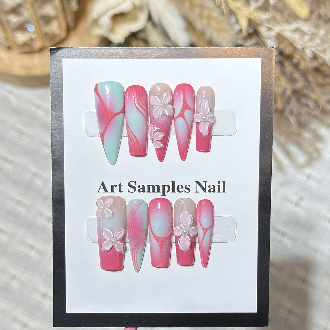 Dekorative Stiletto Press-On Nägel mit floralen Designs Karnz