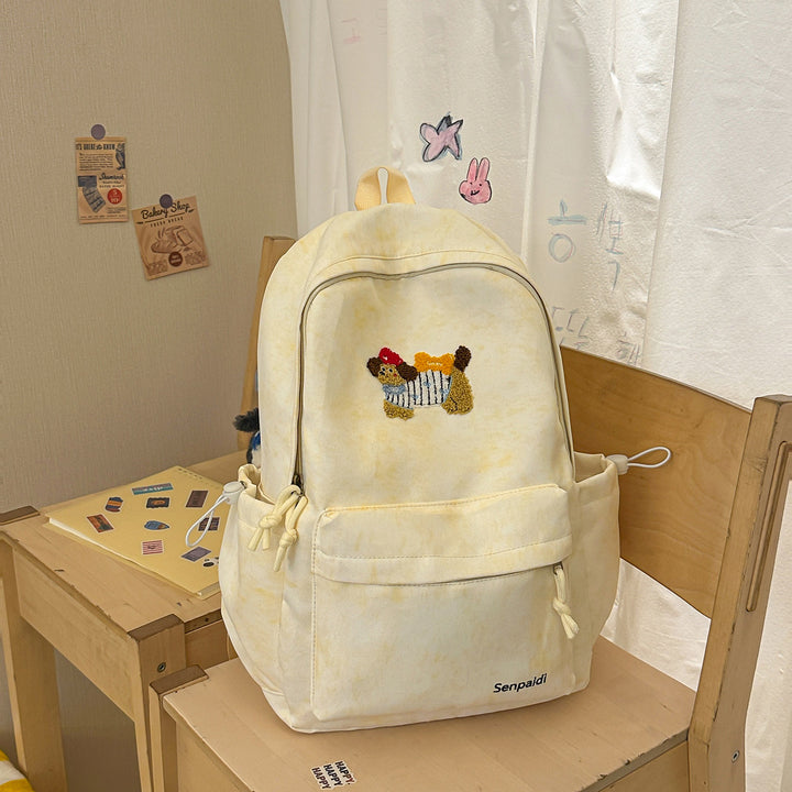 Verspielt bestickter Rucksack