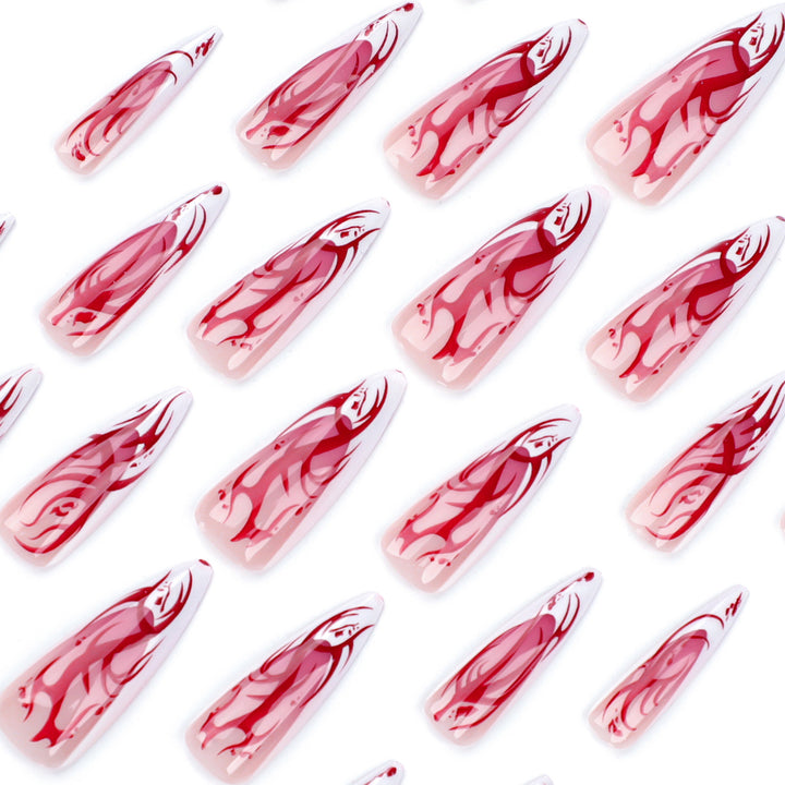Kunstvolle Stiletto-Nägel mit künstlerischem Farbverlauf Karnz