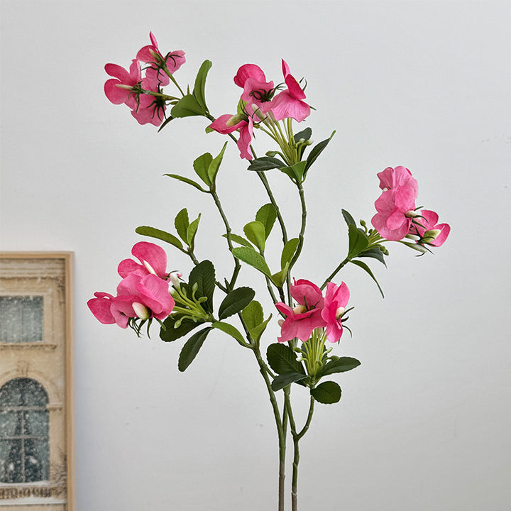 Künstlicher Blütenzweig mit lebhaften rosa Blüten Karnz