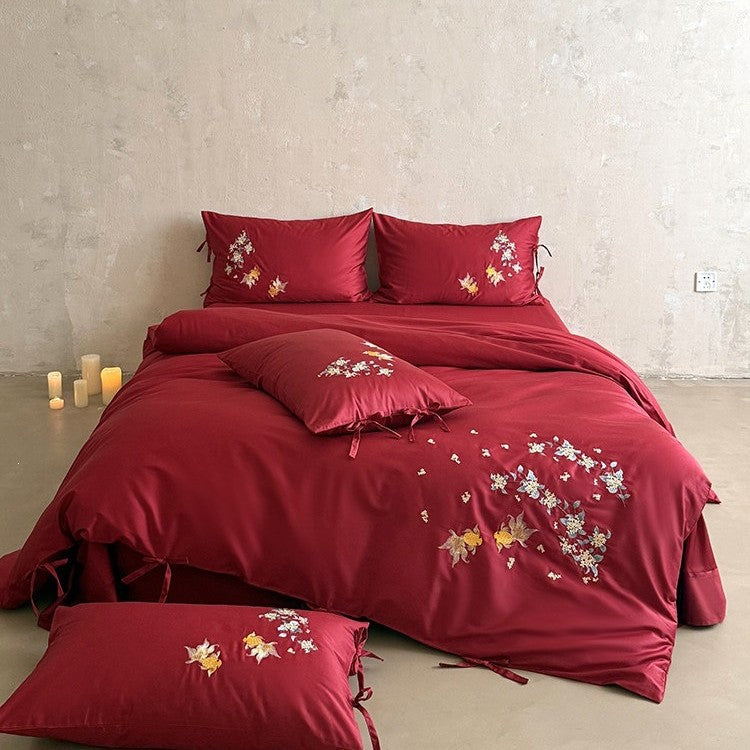 Luxuriöses Satin-Bettwäscheset mit aufwendiger floral-fischiger Stickerei