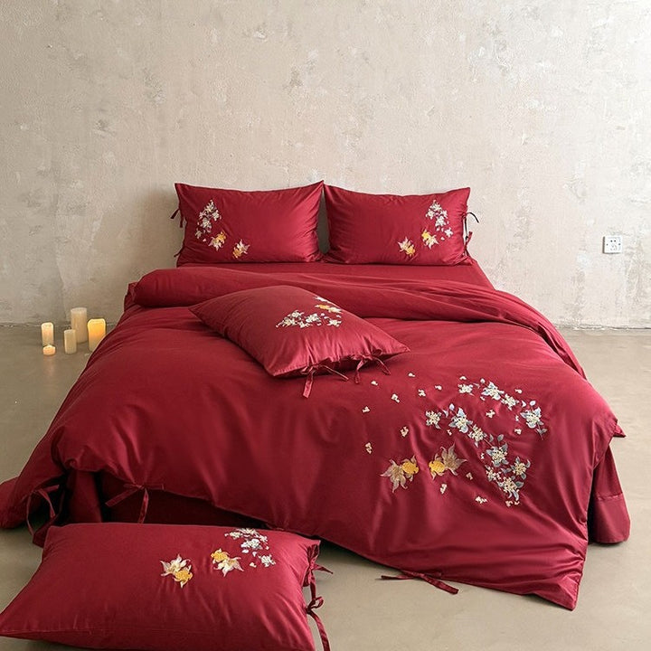 Luxuriöses Satin-Bettwäscheset mit aufwendiger floral-fischiger Stickerei
