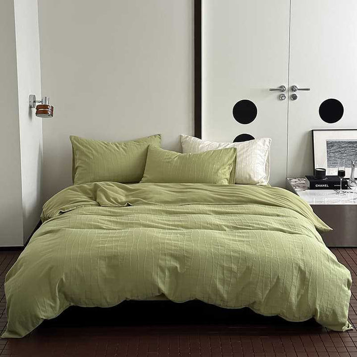 Gepflegtes Percale-Baumwoll-Bettwäsche-Set mit subtiler welliger Textur und Umschlagverschluss