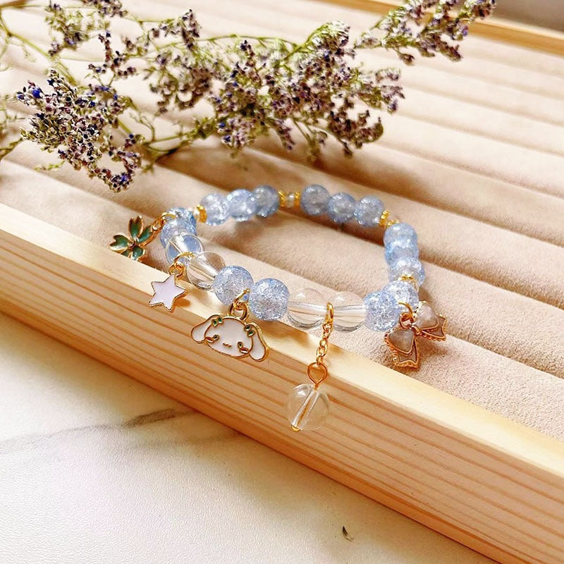 Elegantes Armband mit Tier- und Glitzeranhängern Karnz