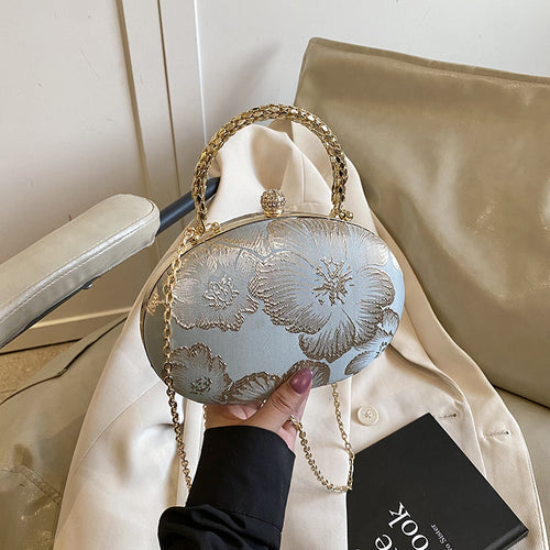 Elegante Blumen Abendtasche Karnz