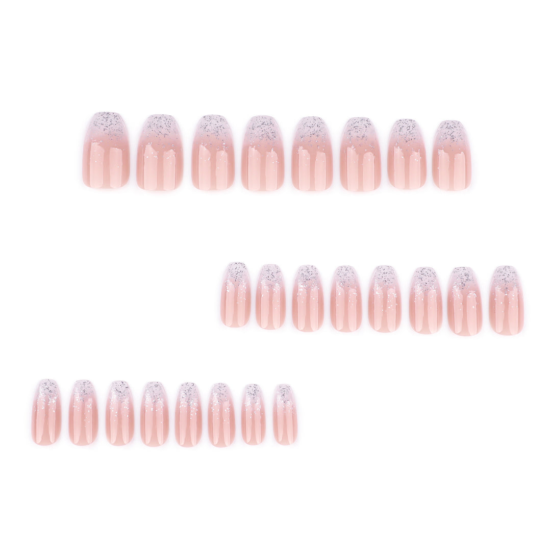 Kunstvolle Nagelverlängerungen mit Glitzer und Ombre-Effekt Karnz