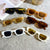 Damen modische Sonnenbrille mit auffälligem Design Karnz