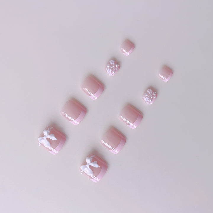 Fußnagelkunstset mit niedlichen 3D-Schleifen- und Perlverzierungen Karnz