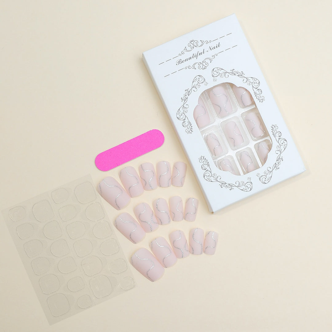 Künstliches Nagelset mit eleganten Linien und Glitzerakzenten Karnz