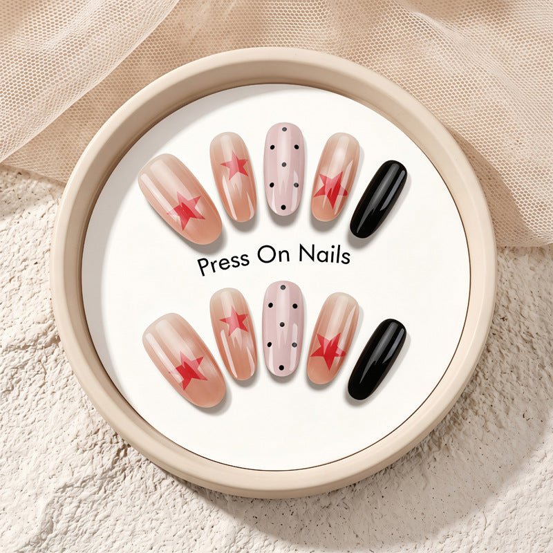 Künstlerisches Press-On-Nagel-Set mit mutigen Stern Designs Karnz