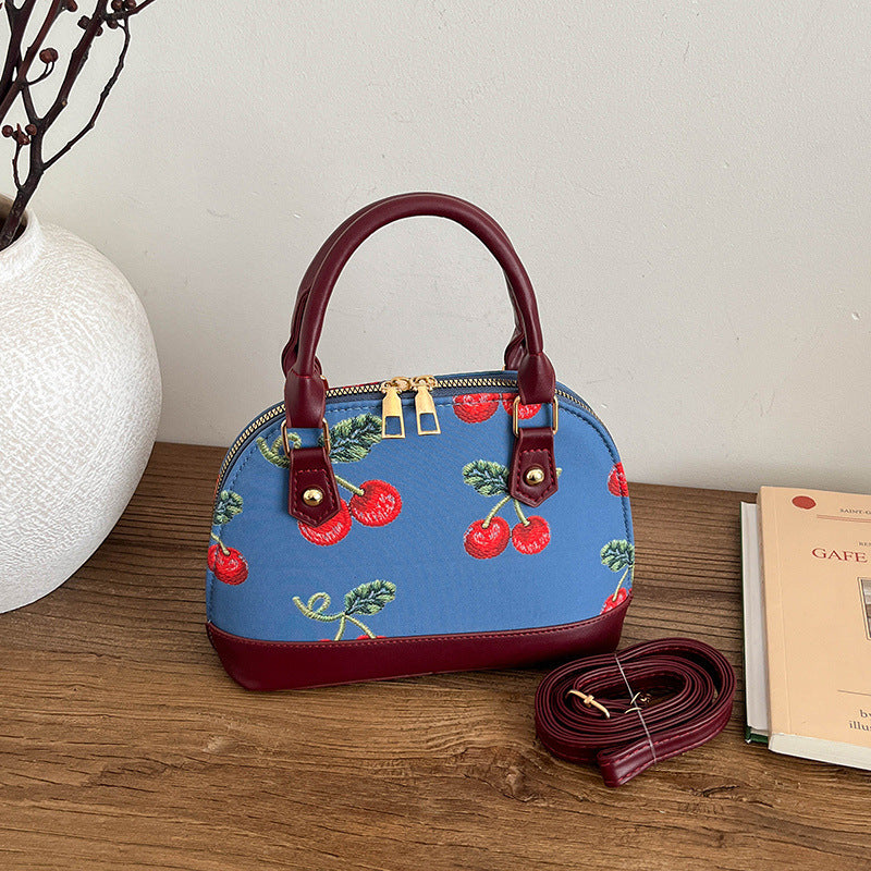 WoBestickte Kirschmuster-Handtasche Karnz