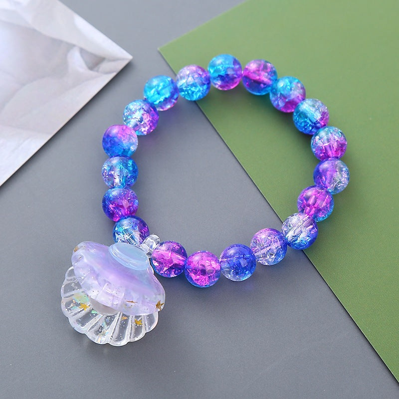 Verspieltes Armband mit Muschel-Anhänger Karnz