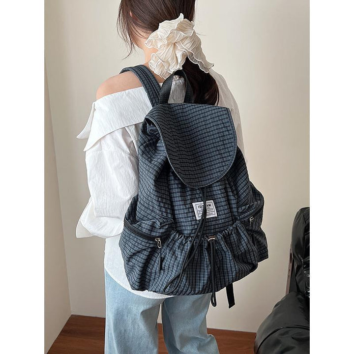 Stylische karierte Rucksack