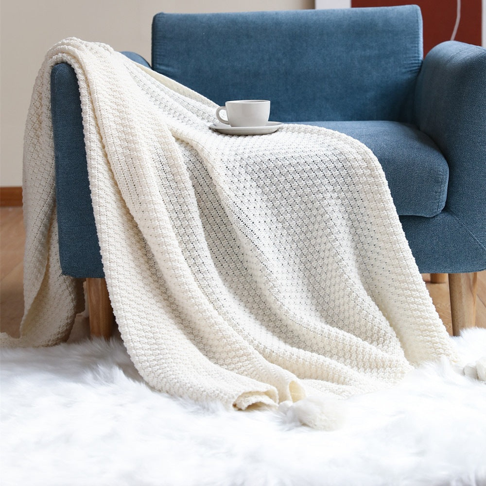 Strukturierte Strickwurfdecke