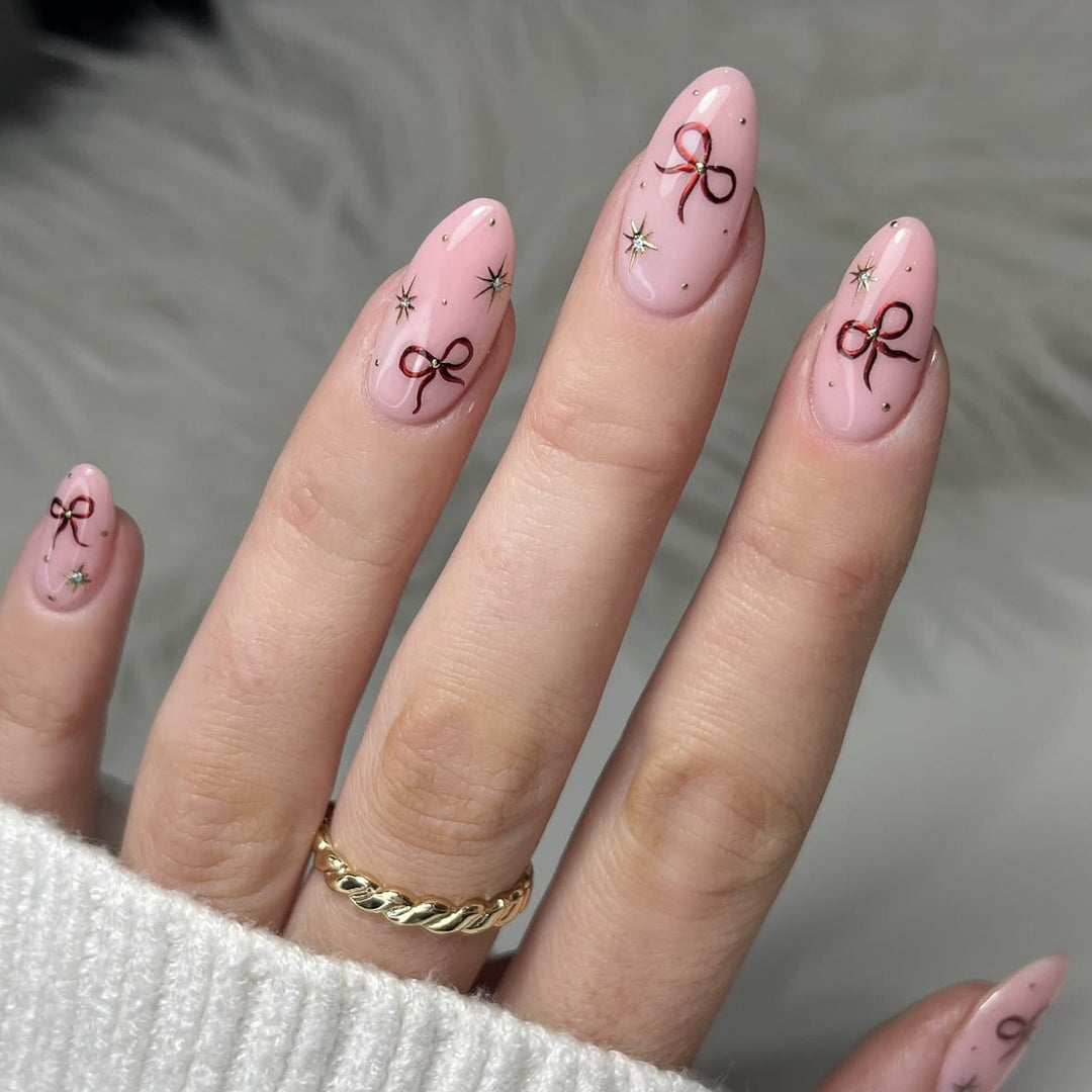 Stiletto-Nail-Art-Extensions mit Schleifenakzenten Karnz