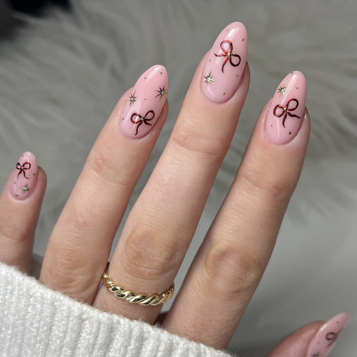 Stiletto-Nail-Art-Extensions mit Schleifenakzenten Karnz