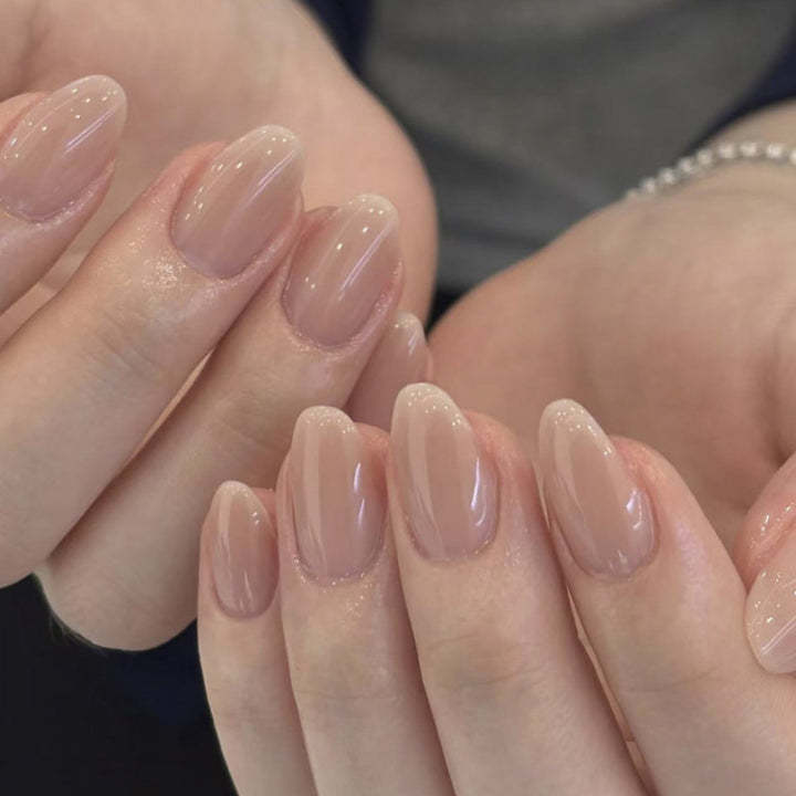 Künstliche Nagelkunst mit verspielten Punkten und Schleifen Karnz