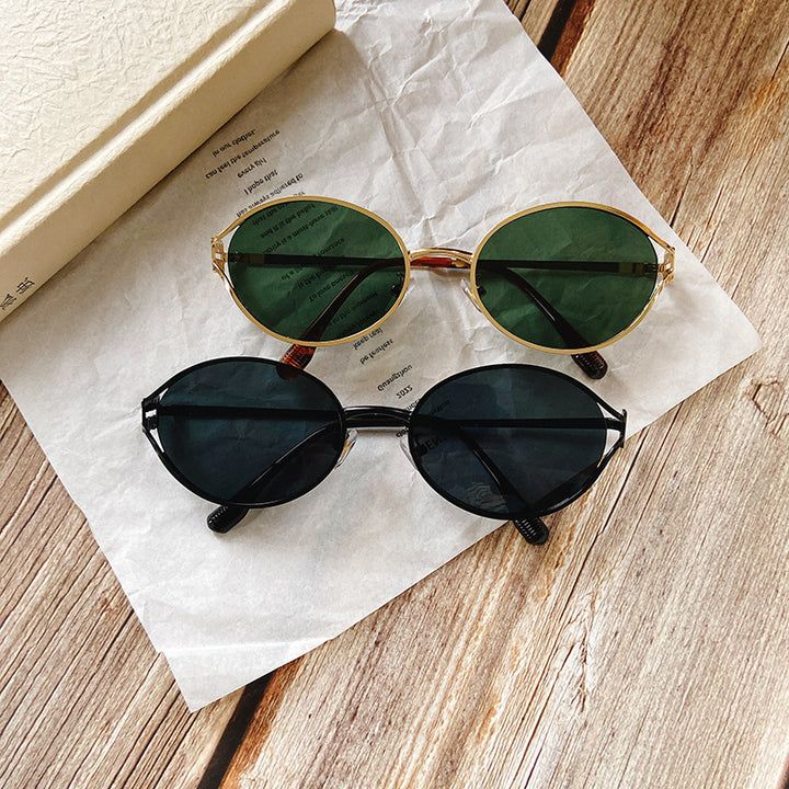 Runde Sonnenbrille mit Goldenen Akzenten Karnz