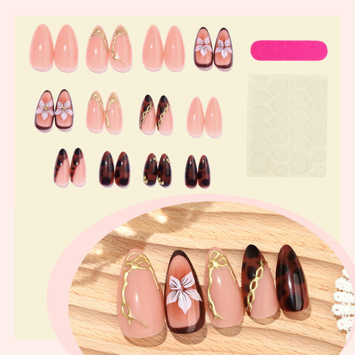 Künstlerisches Press-On-Nagelset mit eleganten Blumen- und abstrakten Designs Karnz