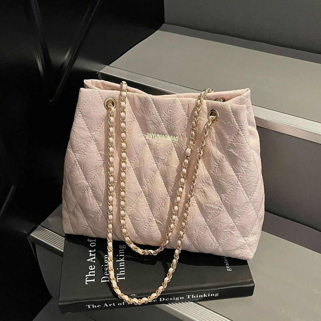 Gepolsterte Tote-Tasche mit Ketten-Details Karnz