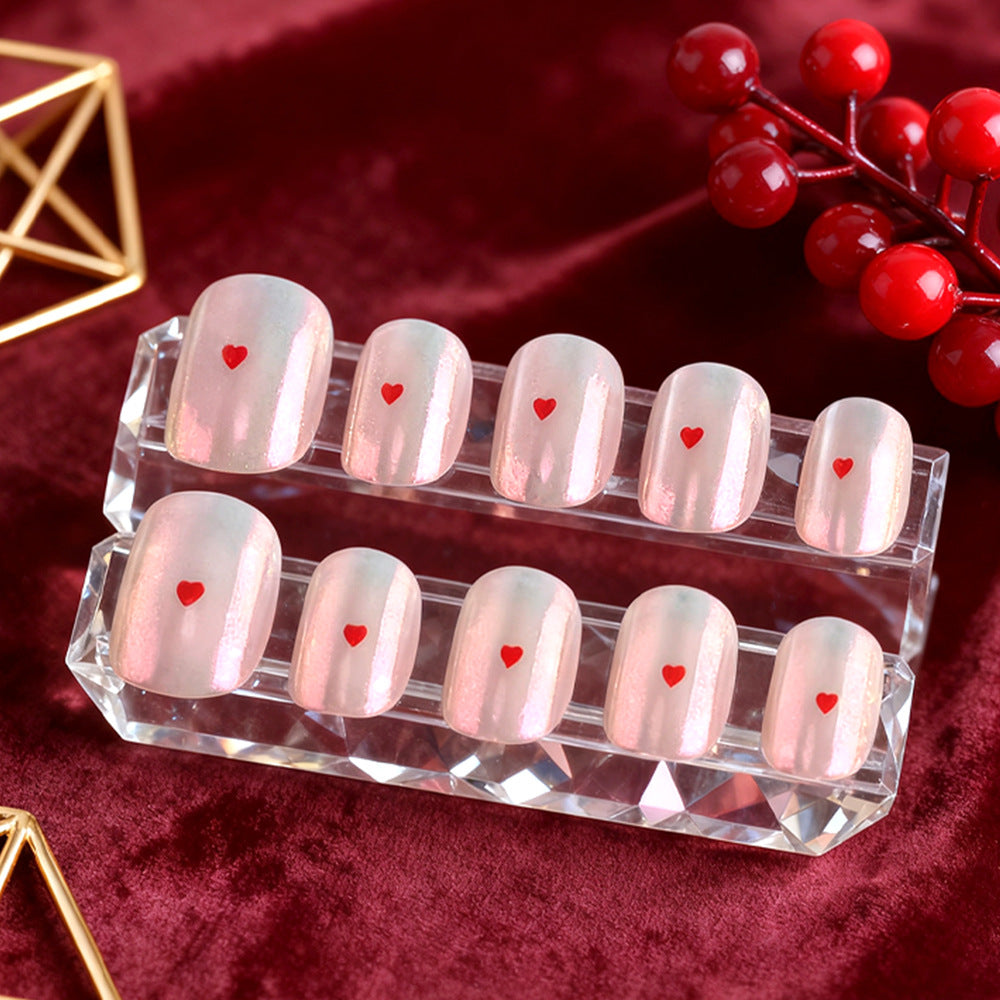 Herz-verzierte Gel-Nagelkunst Karnz
