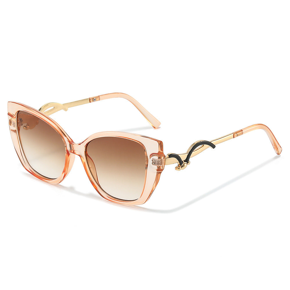 Übergroße Geometrische Katzenaugen-Sonnenbrille mit goldenen Akzenten Karnz