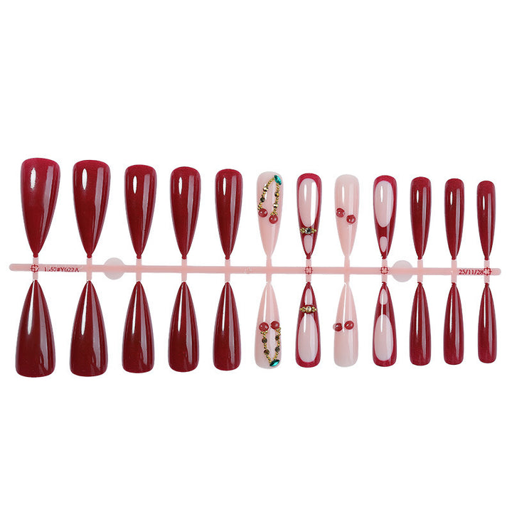 Kunstnagelset mit elegantem Rot- und Rosa-Design Karnz