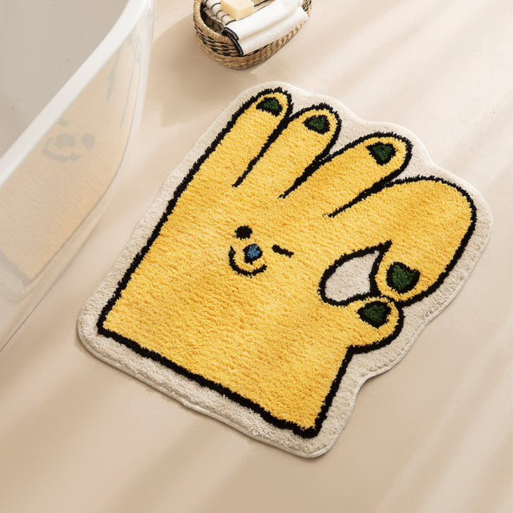Geformter Badteppich in Handform mit tuftierter Chenille‑Textur und rutschfester Unterseite
