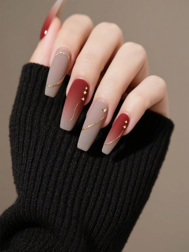Künstlerisches Gradient Press-On Nagelset mit Sternakzenten