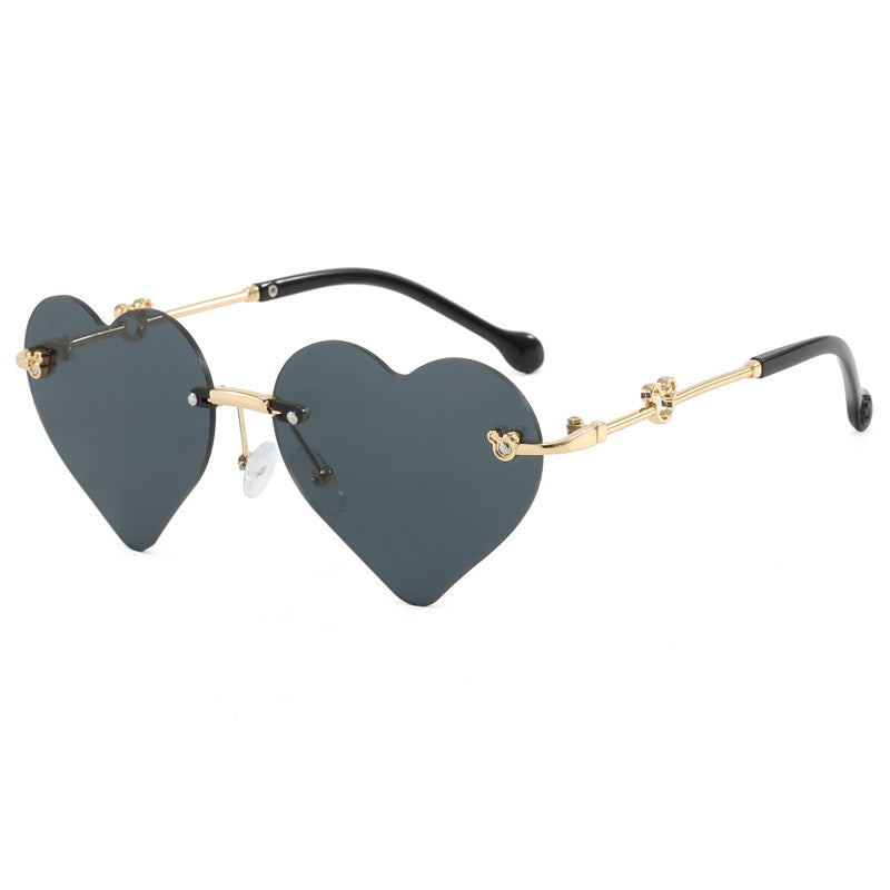 Damen Herzförmige Sonnenbrille mit verspiegelten Gläsern Karnz