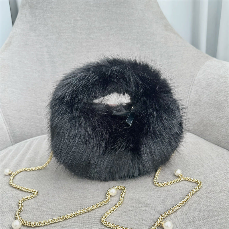Elegante Faux Fur Rundtasche